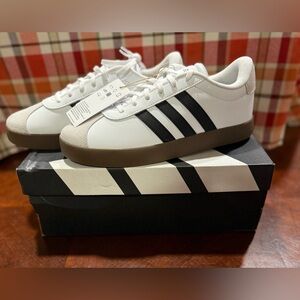 Adidas Woman’s White Sneakers with Black Stripes and Brown Sole